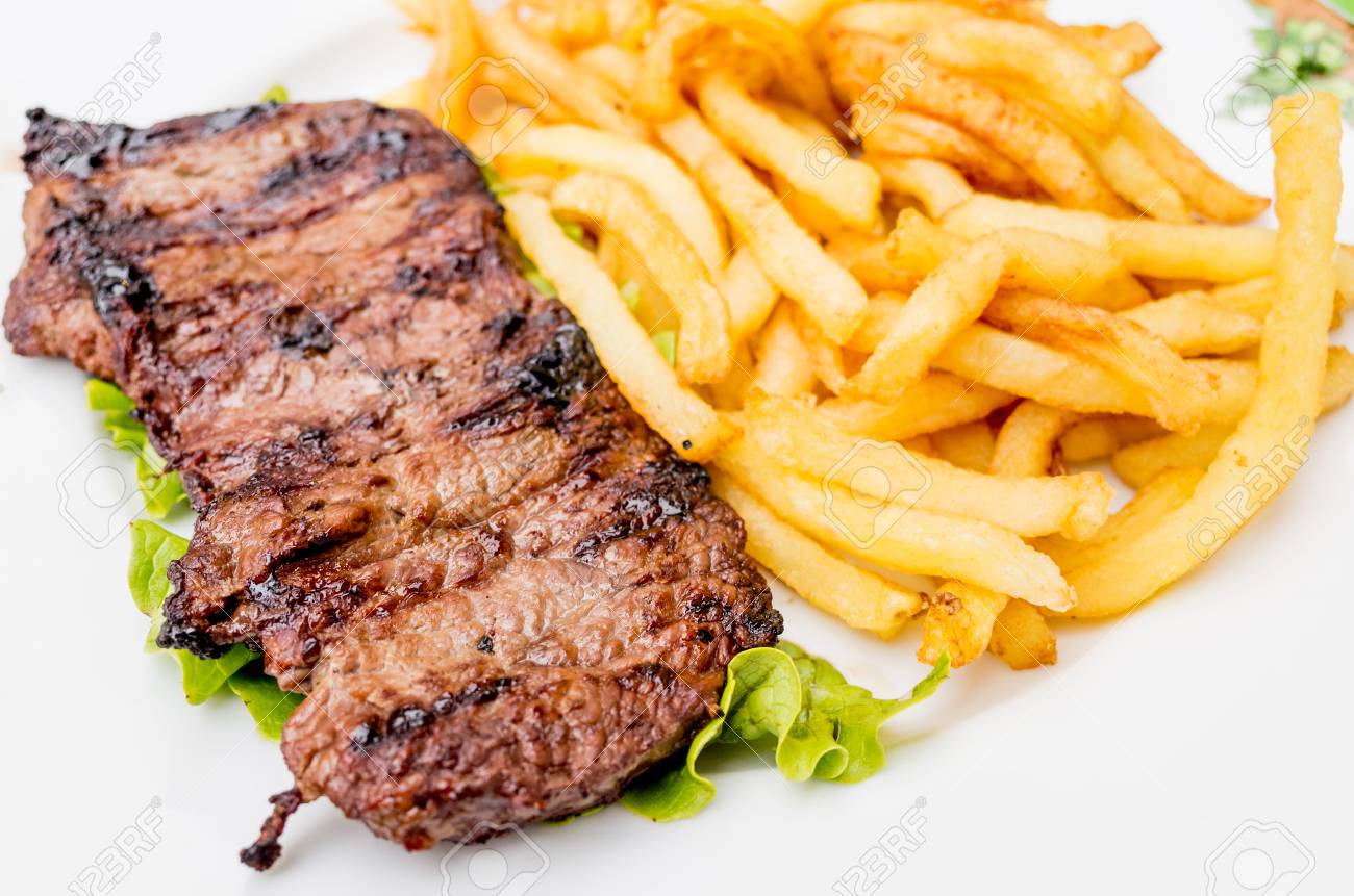 juicy steak beef meat with french fries